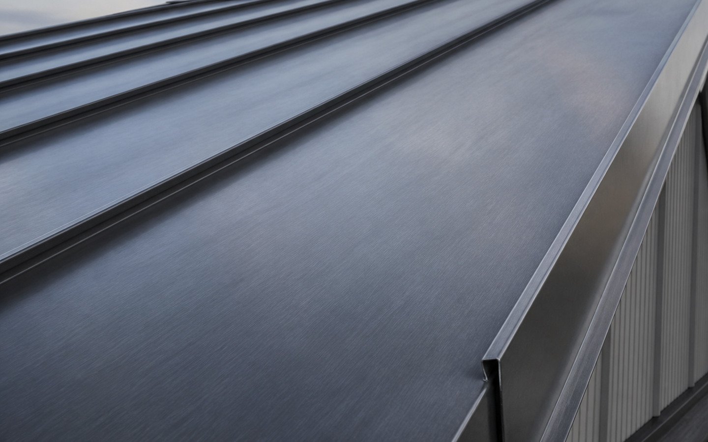 Standing-seam metal roof covering